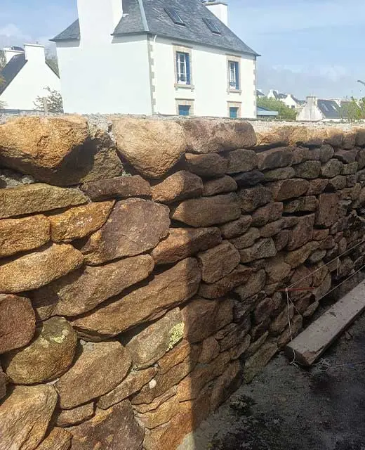Pose de pierre naturelle sur muret à Audierne par Alto TP