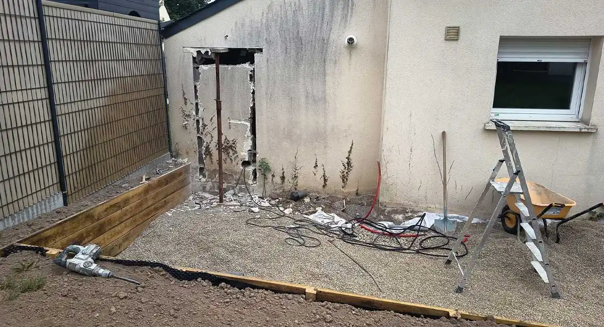 Ouverture mur pour création porte accès au garage